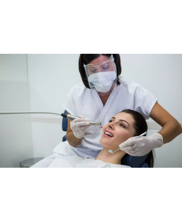 dentist-examining-female-patient-with-tools-copy-1920x1200